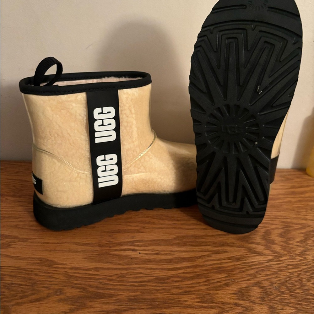 Clear mini Uggs size 8.. worn once too small for my foot and never returned them